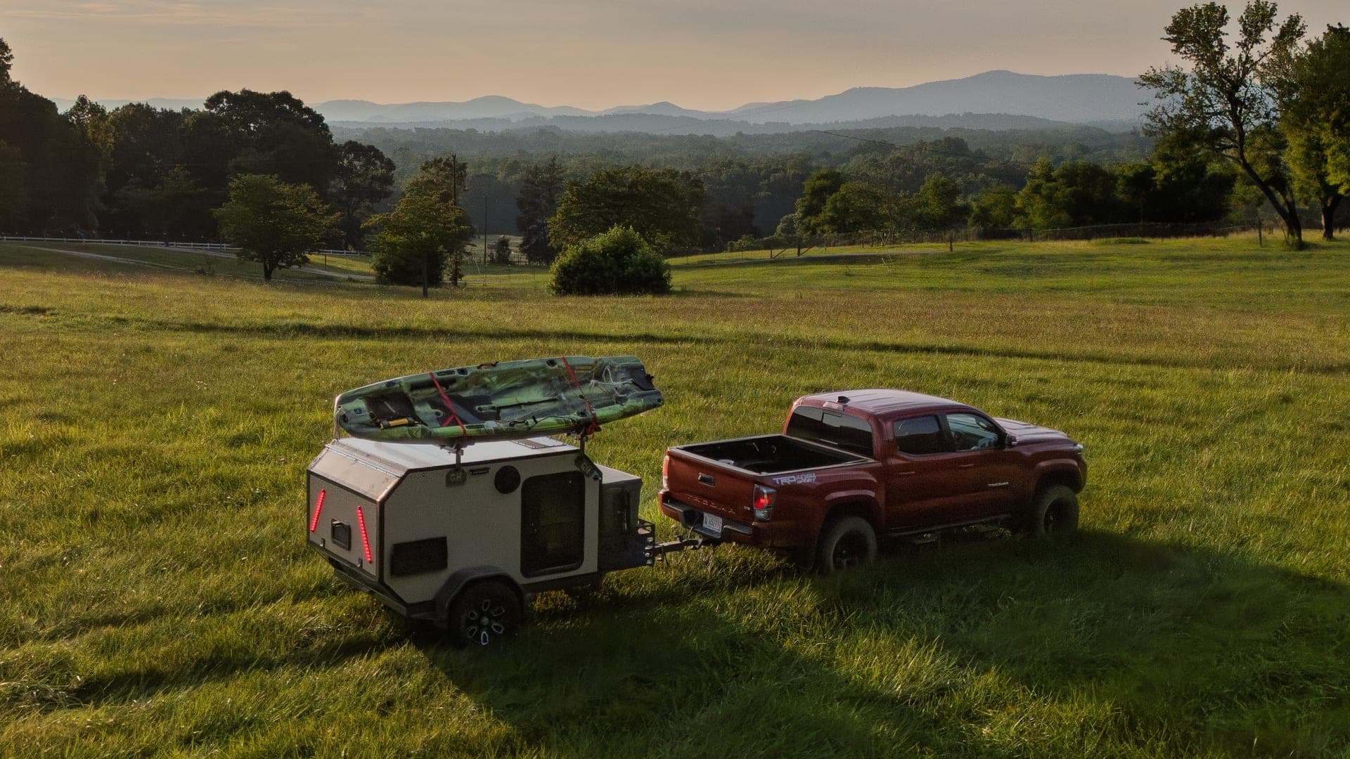 Gear Hub 93X Squaredrop trailer at golden hour in an open field